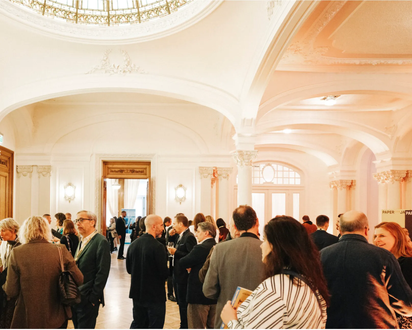 Networking reception in the foyer of Cercle Cité following the keynote